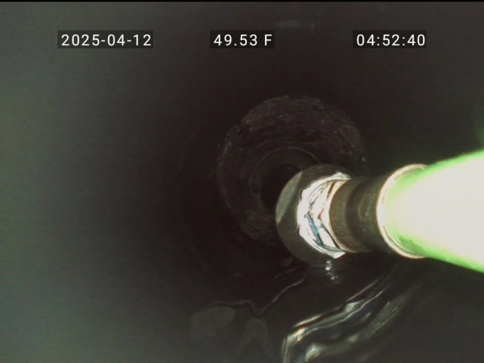 Camera head traveling through a sewer or septic pipe