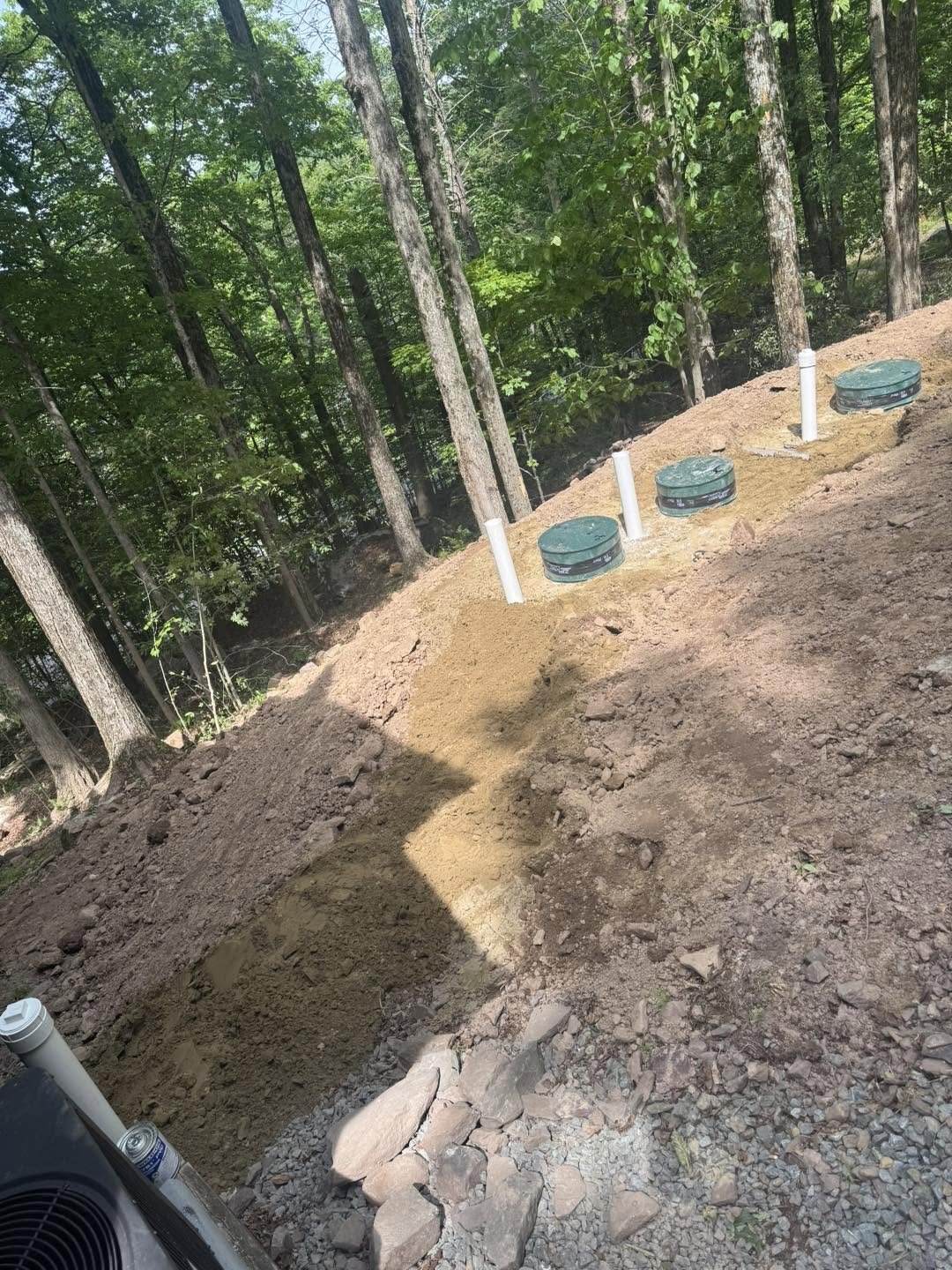 Septic system with multiple risers installed