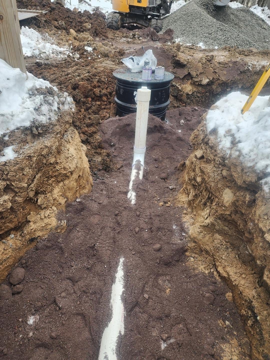 New septic tank and piping installation area