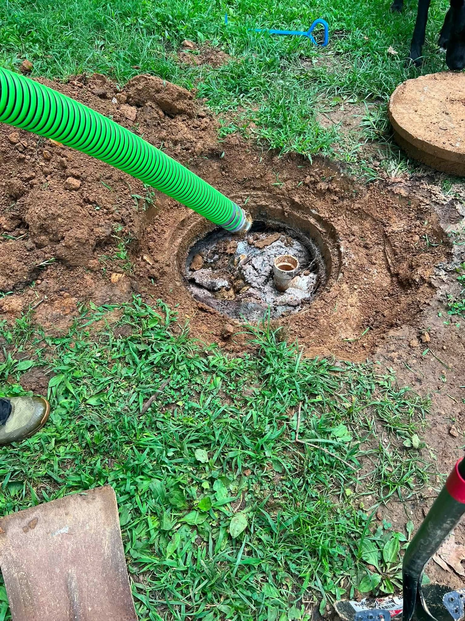 Septic tank pumping in progress